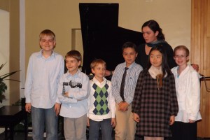 Julia and six out of eight of her piano and voice students this past year